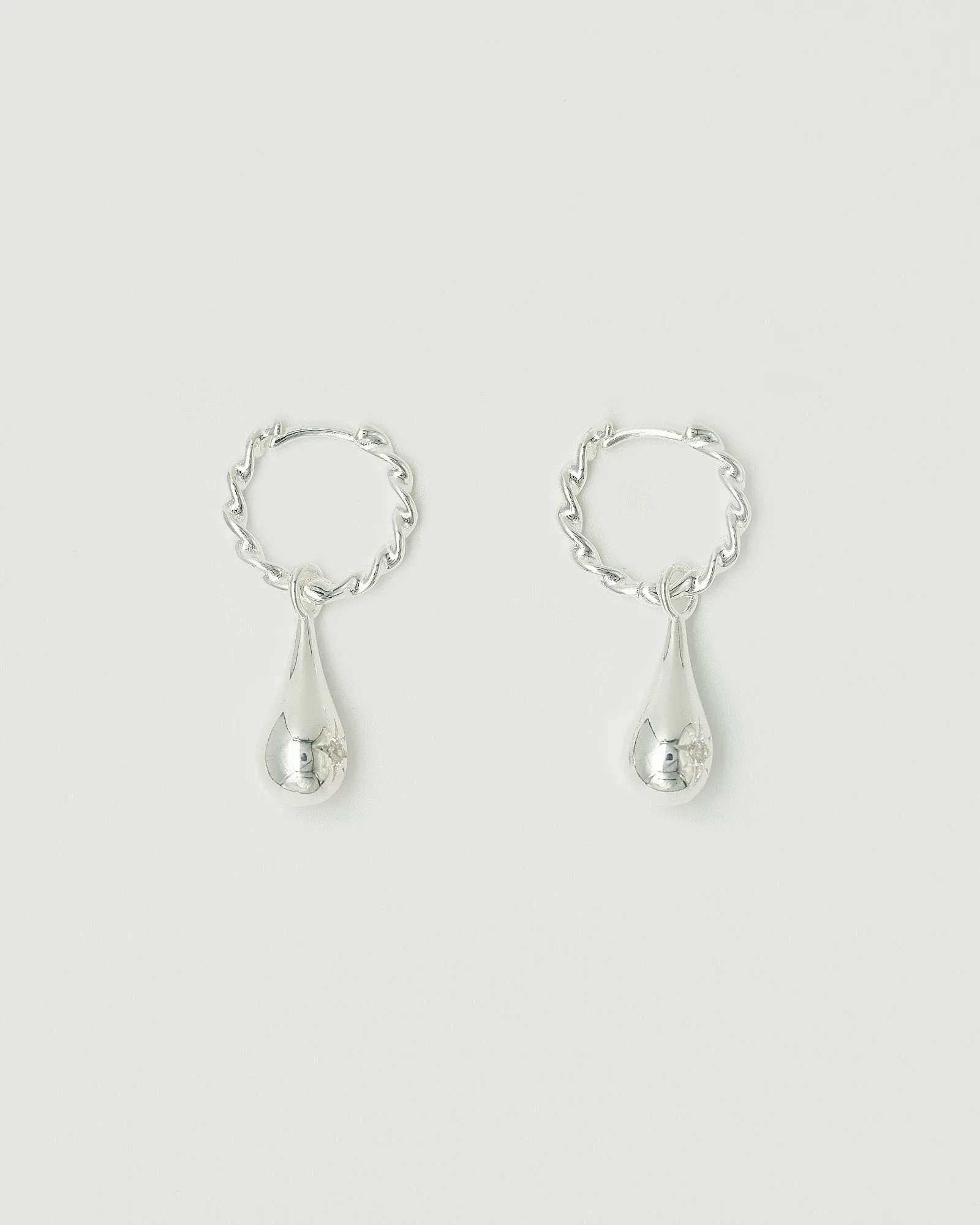 Tear Drop Twist Sleeper Earrings Clear